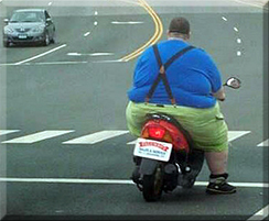 Fat man on bike